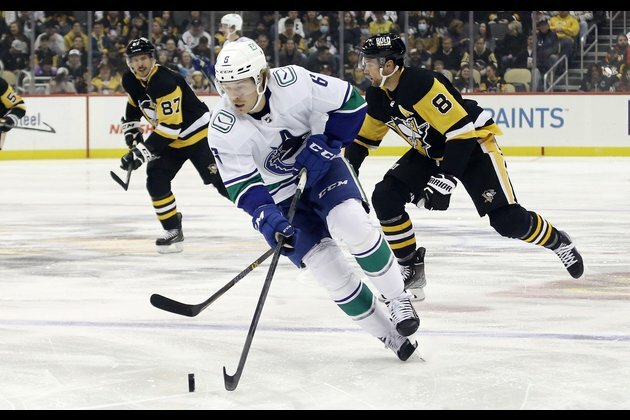 Penguins thrash Canucks behind Jake Guentzel's hat trick