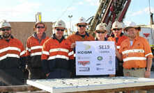 Team at Kalgoorlie's Super Pit gold mine in Western Australia celebrates new drilling landmark