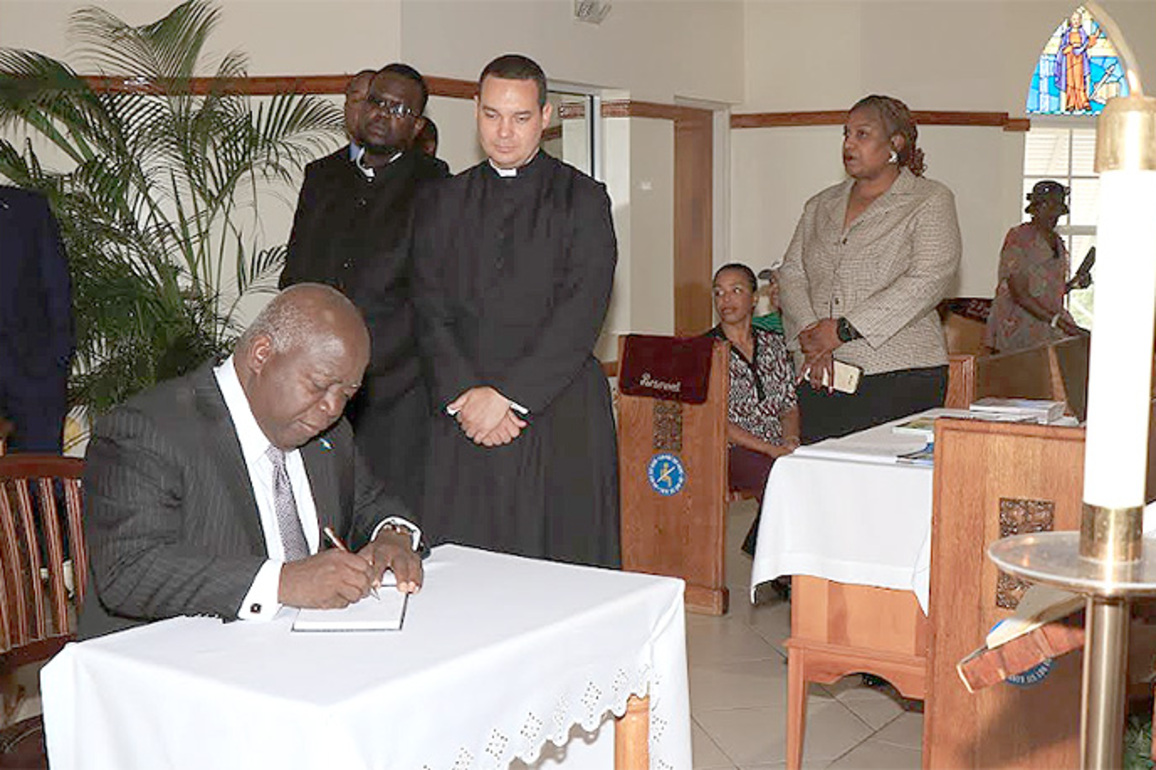 Prime Minister Philip Davis signs the Book of Condolence on the passing of Pope Francis
