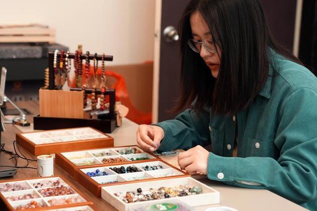 How tiny beads shape a big trend in China's experience economy
