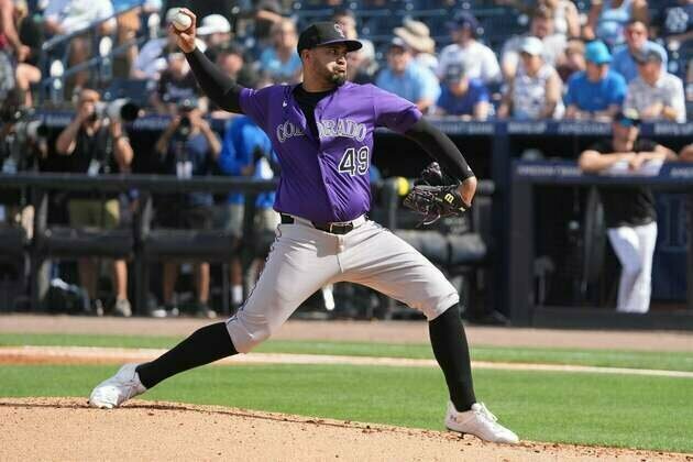 Rockies hold off Rays to pick up first win of season