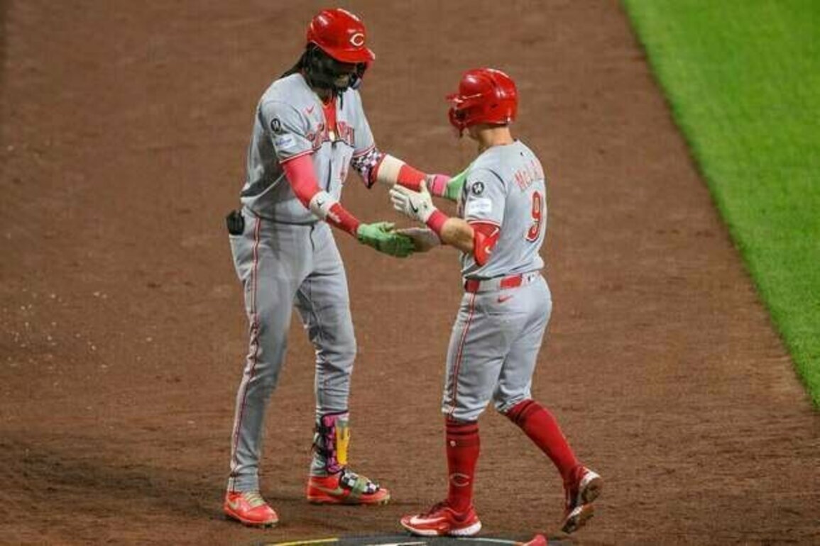 Reds slug three HRs while cruising past Orioles