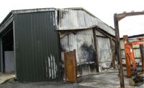 Farm fined over £130,000 after worker falls through barn's fire-damaged roof