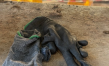 The gloves worn by the injured coal mine worker did not address high-pressure fluid injection risks.