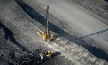  Laying explosives in preparation for blasting the rock mass at the Krasnobrodsky open pit coal mine