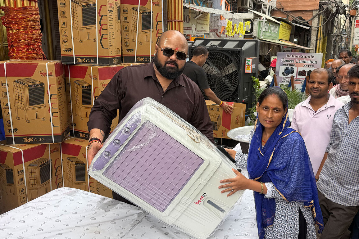 World Champion Mahant Gaurav Sharma distributes air coolers to needy people on his birthday