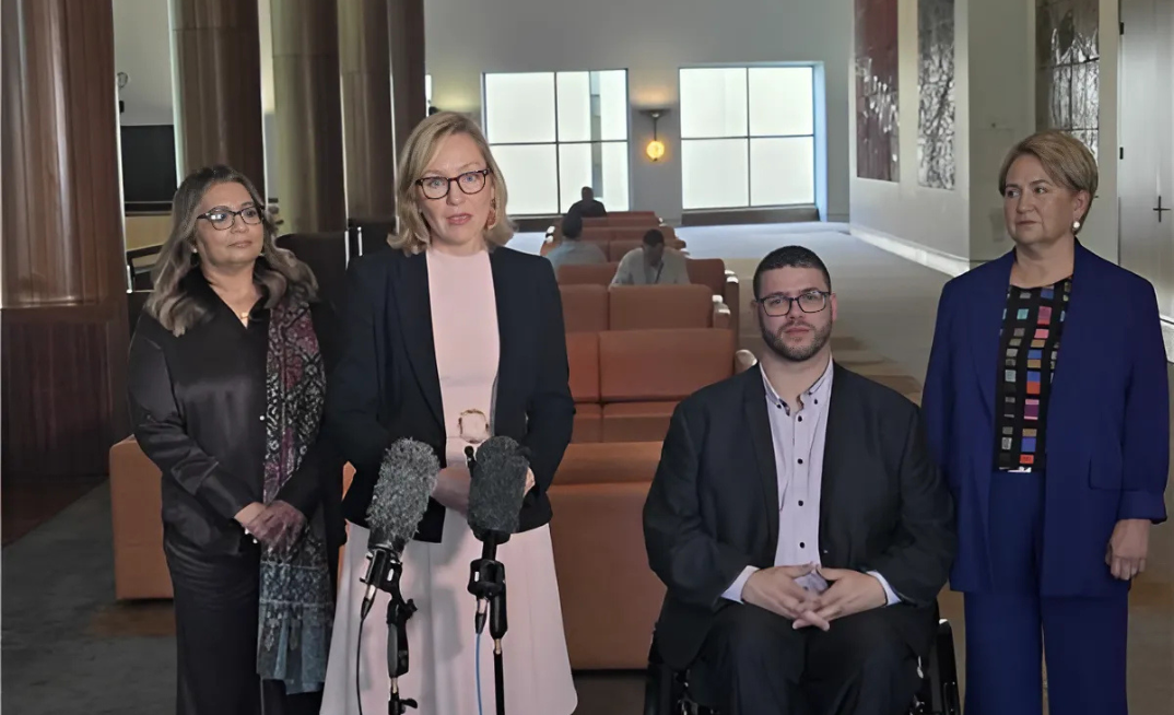 Senator Larissa Waters alongside Green party colleagues