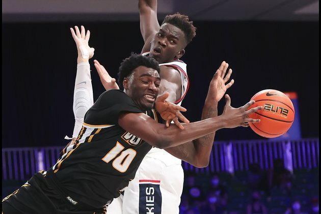 After close call in return, UConn meets St. John's