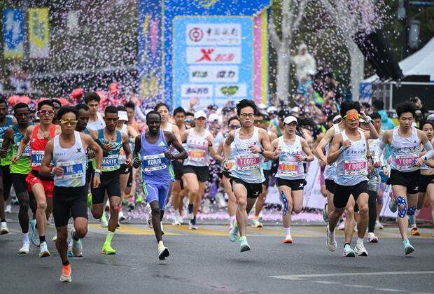 Feature: What has the marathon craze brought to China?