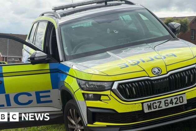 Downpatrick- Shot fired as officer is struck by stolen police car