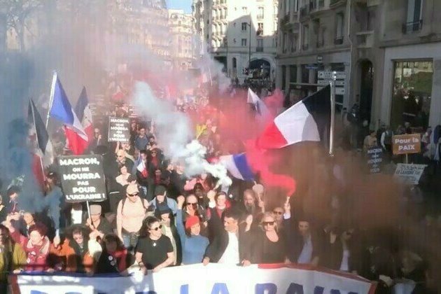 Thousands protest in Paris against Macrons defense policies 