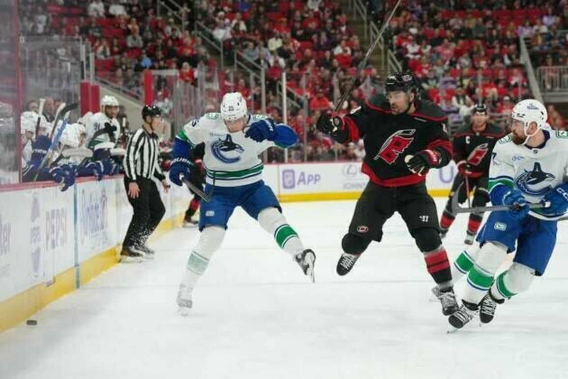 Sebastian Aho's late OT goal propels Hurricanes past Canucks