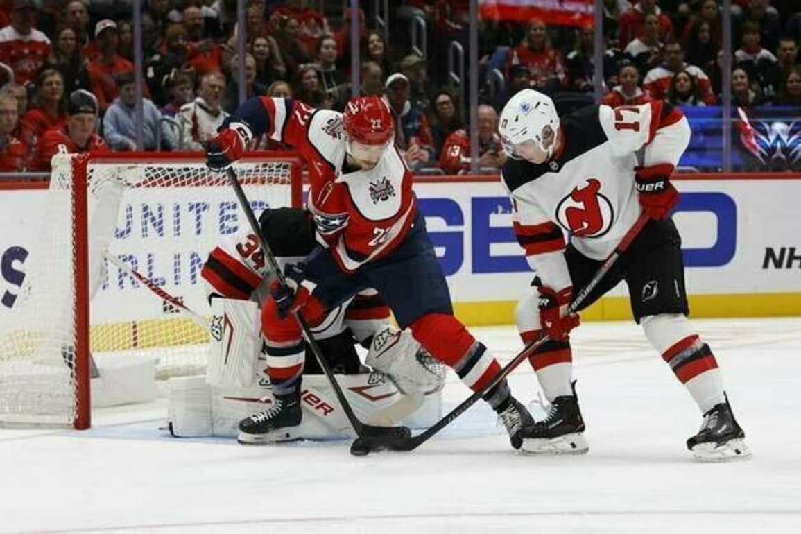 Devils again work OT, edge Capitals in shootout
