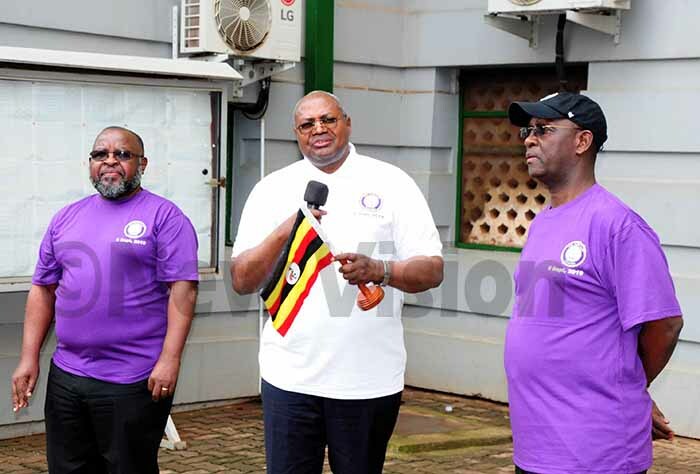  rincipal udge orokamu amwine  addressing the runner as udge of igh ourt oseph ulangira  and ermanent ecretary ius igirimana looks on his was  during the  launch udicial ealth un at igh ourt amapalahoto by amadhan bbey 