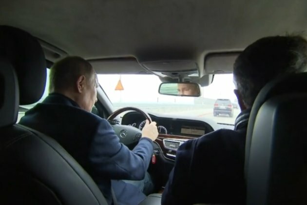 Putin drives over repaired Crimean Bridge
