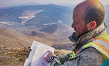  Millrock senior project geologist Chris Van Treeck with N27/Millrock claims in the foreground towards the river, with Northern Star’s Pogo mine in the background