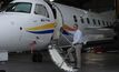 Rossair director Mark Lindh and the Embraer Brasilia