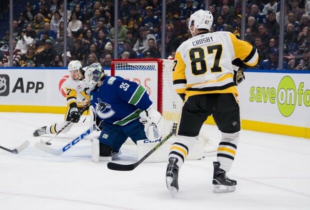 Erik Karlsson's OT tally lifts Penguins over Canucks