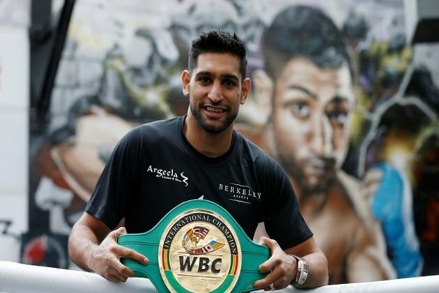 Legendary British boxer and former world champion Amir Khan announces retirement