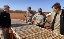  Examining core from recent drilling