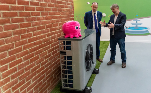 Lord Callanan inspects a heat pump with Octopus founder Greg Jackson | Credit: Otopus 
