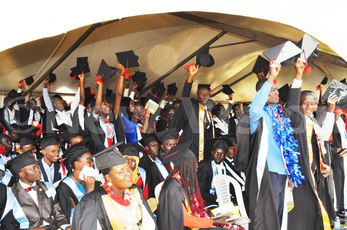  he graduands under the department of electronics celebrating during their graduation ceremony 