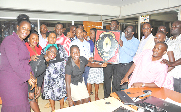 Abakozi ba MK Publishers nga basanyukidde Engabo. Abakozi ba MK Publishers nga basanyukidde Engabo.