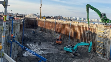 Sheet piles driven into the ground to secure the excavation pit as part of the construction of the Nordhavn Tunnel in Copenhagen