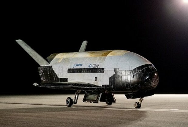 US space plane lands after 908 days in orbit