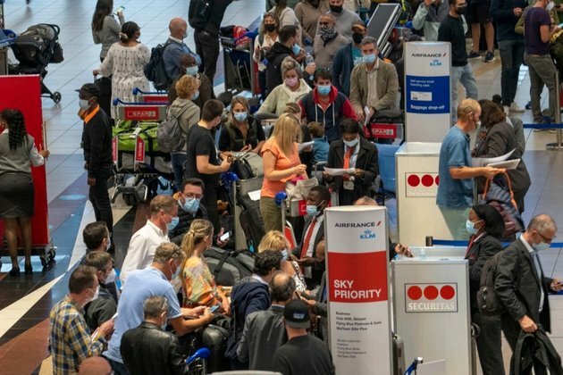 Biden Announces Air Travel Restrictions on 8 Countries