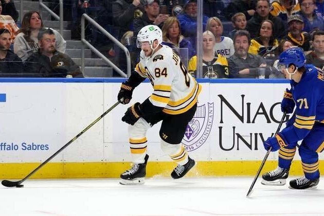 Bruins rally in third, upend Sabres in OT for pivotal win