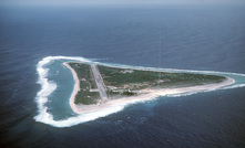 Aerial view of Minamitori Island (Minami-Torishima), Japan. There is a runway which supported the US Coast Guard station located there prior to 1993. Minamitori Island is the easternmost island of the Japanese archipelago.