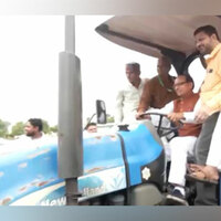Union Minister Shivraj Singh Chouhan drives tractor during his Indore visit