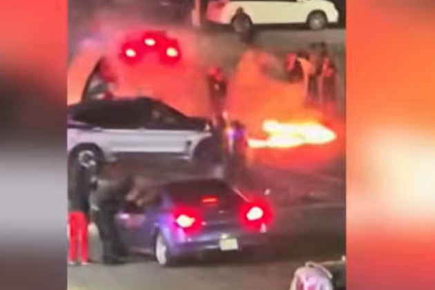 NYPD responds to Queens street takeover, group jumps on cruiser to break windshield