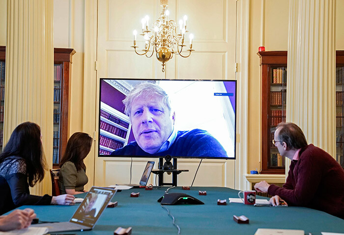   handout picture released by 10 owning treet the office of the ritish prime minister on arch 28 2020 shows an image of ritains rime inister oris ohnson on a screen as he remotely chairs the morning novel coronavirus ovid19 meeting by video link in owning treet in central ondo