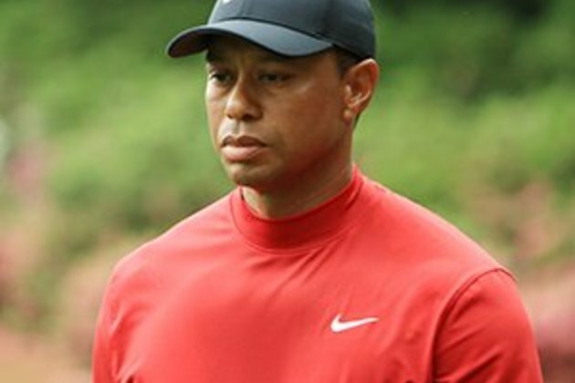 Tiger turns back the clock, roars to Masters glory
