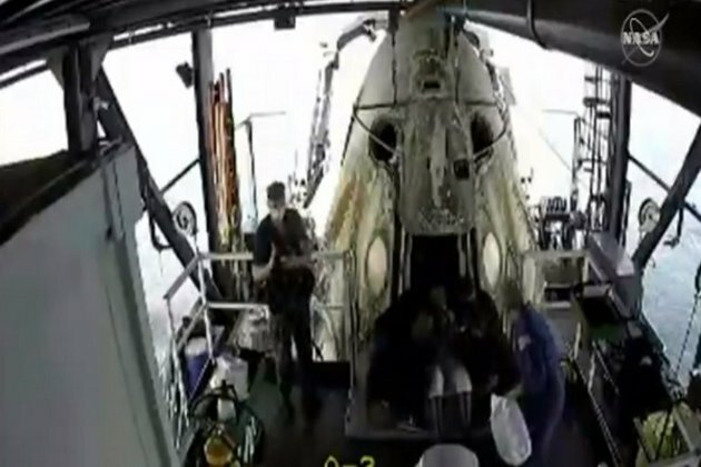 SpaceX capsule opens, NASA astronauts brought out of spacecraft