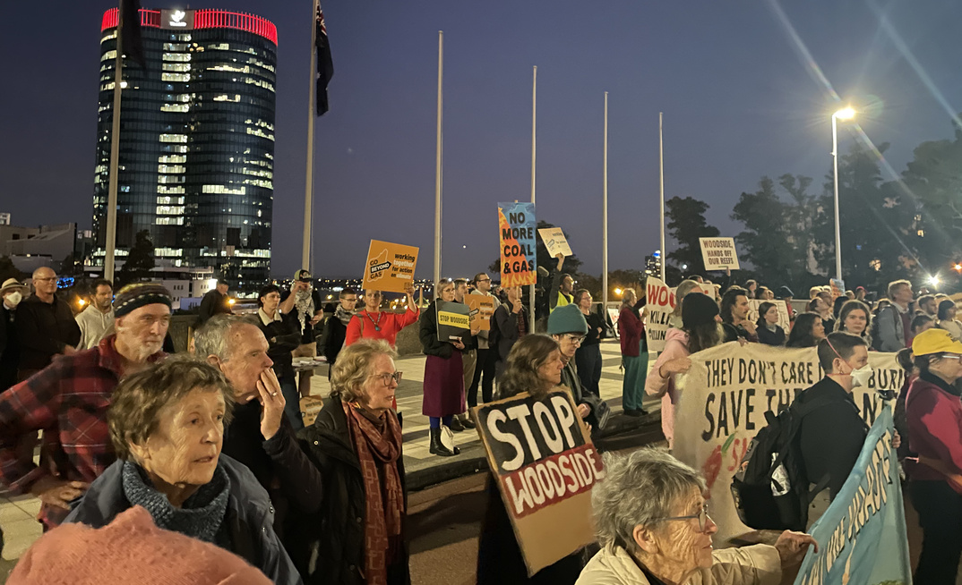 Protestors making their feelings known in the shadow of Woodside's HQ