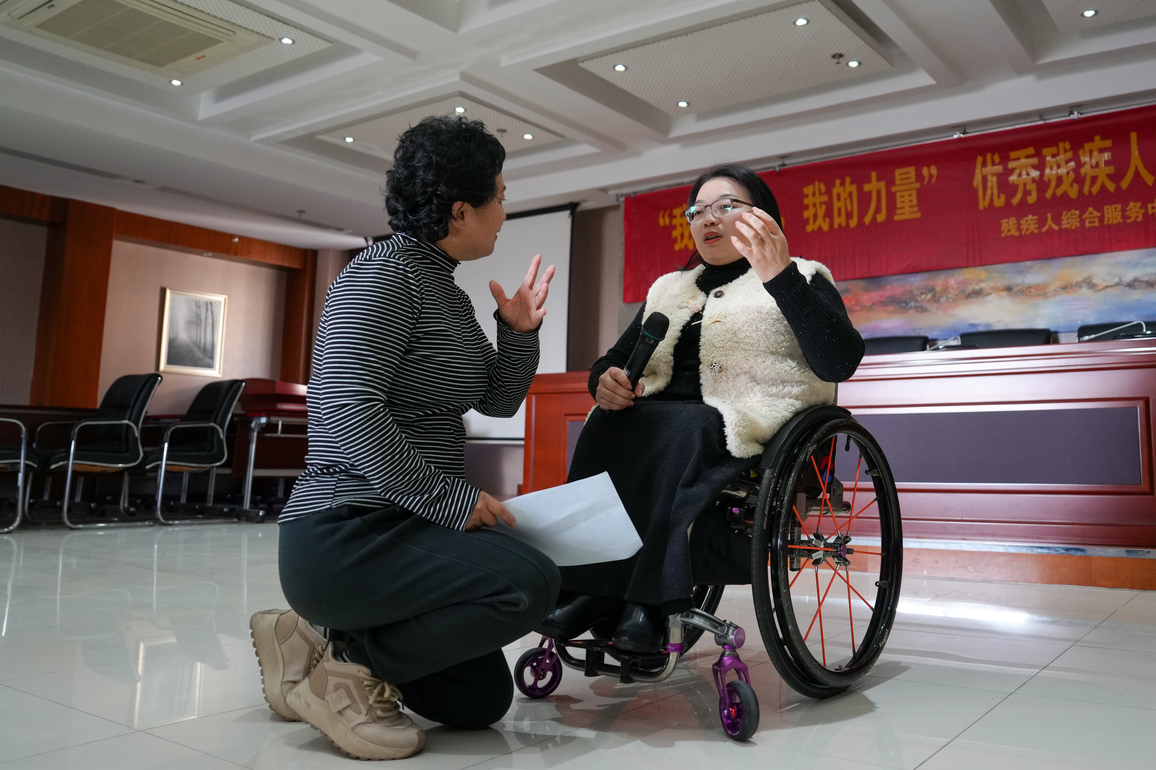 ChineseToday | A guide in wheelchair who empowers people with disabilities in Nanjing