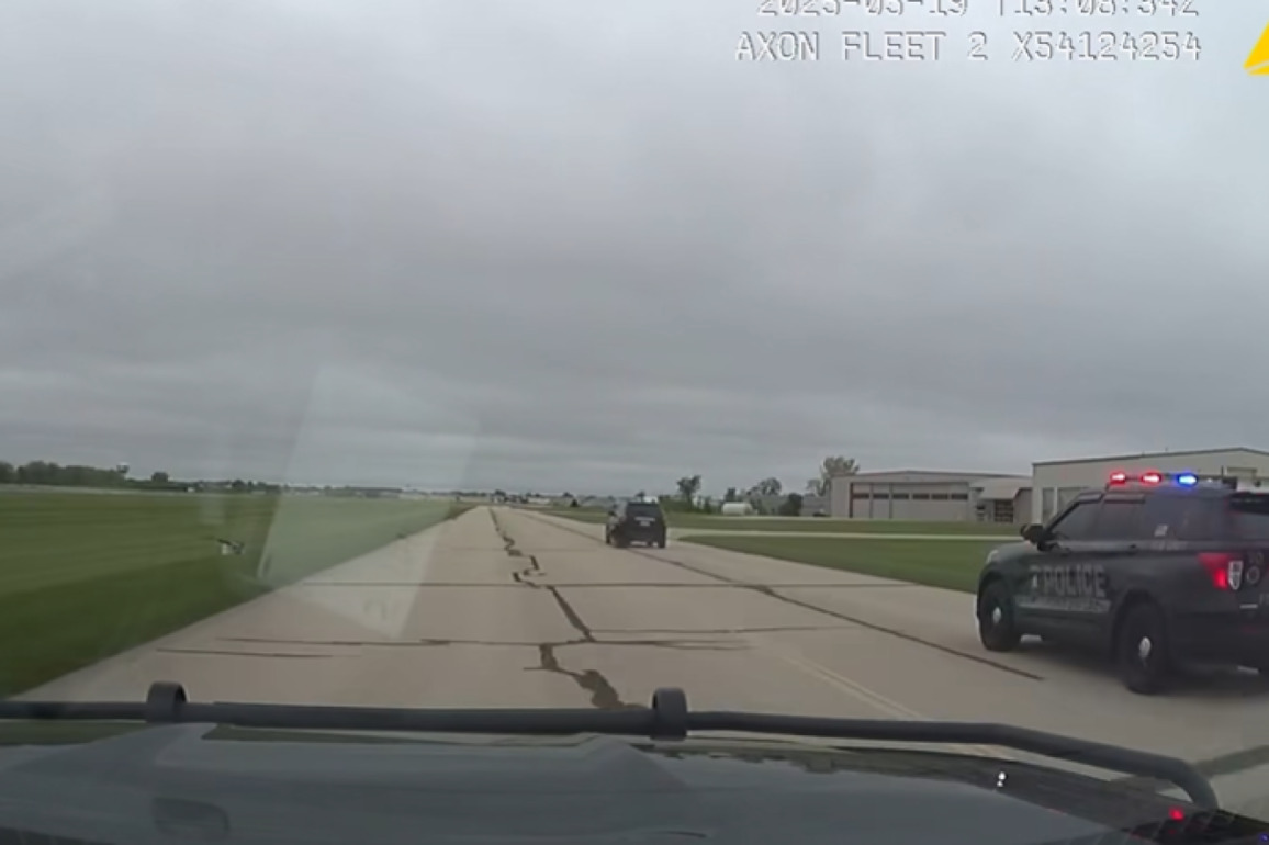 Video- Driver crosses Wis. airport taxiway in 18-mile pursuit