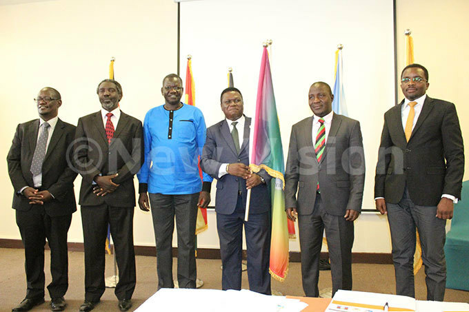  rom left to right xecutive ecretary of  rank usa resident  ganda eoples onference  immy kena hairperson nter arty rganisation for ialogue  and resident for  emocratic arty orbert ao resident  orum for emocratic hange  atrick boi muriat resident for ustice orum suman asalirwa and ational sistance ovement   eputy ational reasurer r enneth mona chat after the handover ceremony for nter arty rganisation for ialogue  hoto by amadhan bbey 