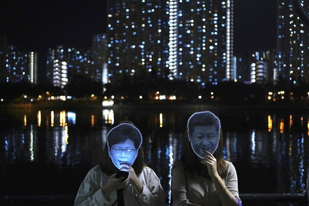 Hong Kong Protesters, Chief Executive Vow Not to Give In