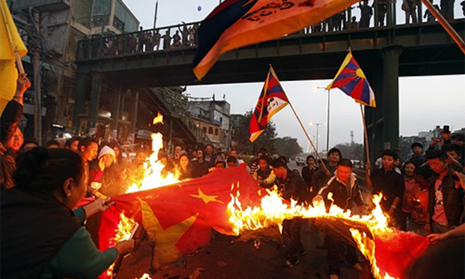 Seven Tibetans burn themselves in anti-Beijing protests Seven Tibetans burn themselves in anti-Beijing protests