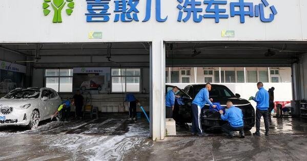 From a Shenzhen car wash, China's push for dignified work reaches some of its most vulnerable