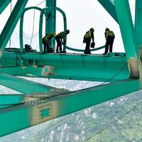 GloriousGuizhou | Tourist attractions being installed on high bridge over Huajiang Grand Canyon