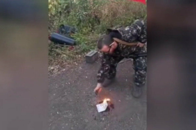 Man fighting for Russia burns his UK passport (VIDEO)