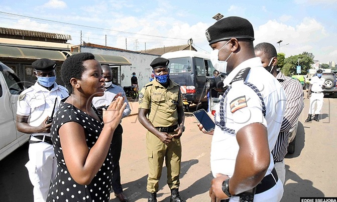 Woman weeps as police arrests hundreds of motorists Woman weeps as police arrests hundreds of motorists