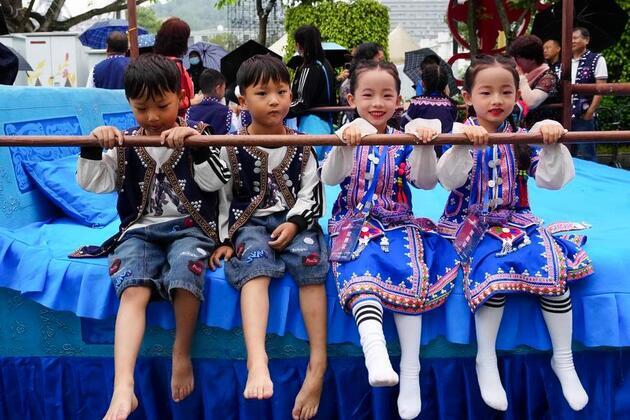 InPics | Twin festival lures tourists in SW China's Yunnan