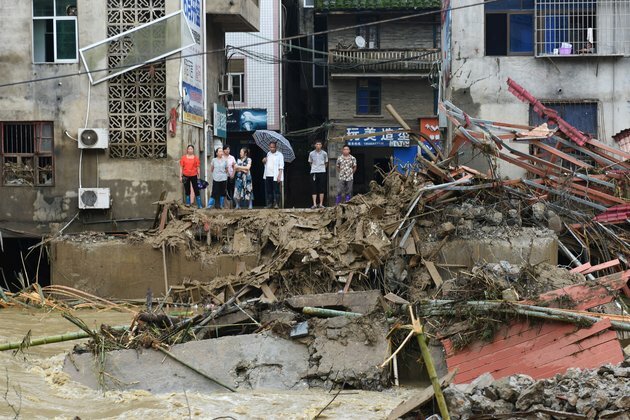 Heavy Rain, Flooding in China Force Evacuation of Nearly 80,000
