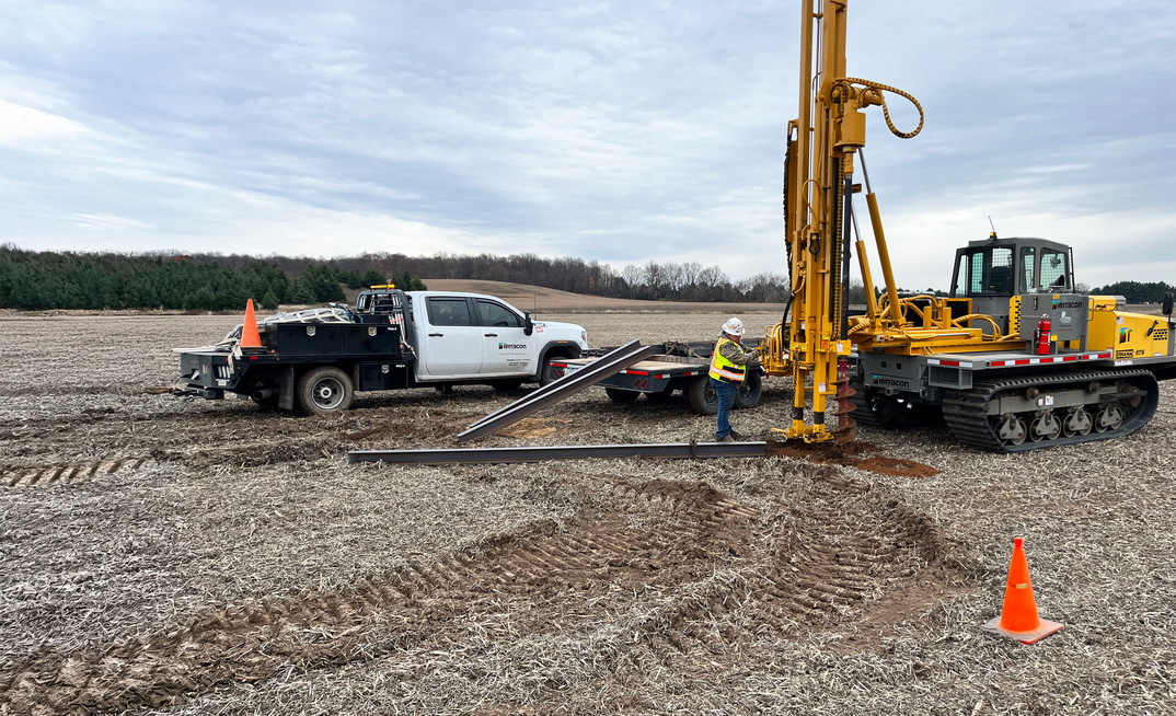 Terracon field crew finished up surface predrilling and prepares to install a set of solar test piles